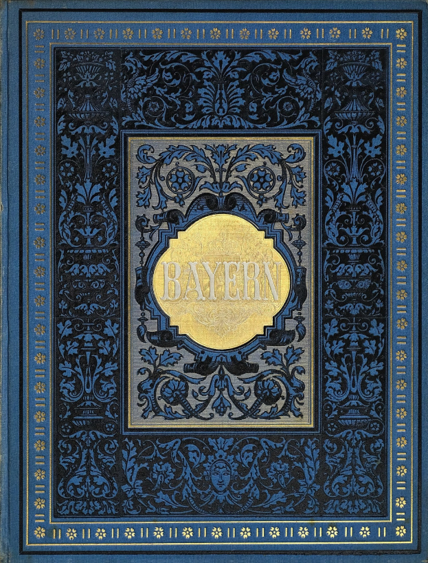 Ein blau-goldenes Buch mit dem Wort "Bayern" auf dem Cover, das mit detaillierten Dekorationsdesigns verziert ist.