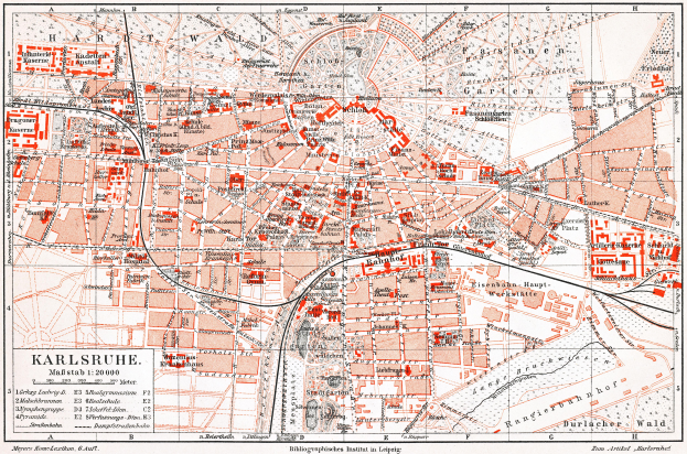 Ein detaillierter Stadtplan von Karlsruhe, Deutschland aus dem Jahr 1900, mit Text und umfassender Stadtanlage.