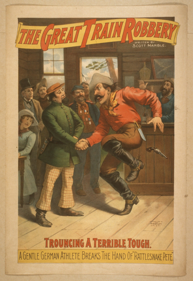 Plakat, das eine Gruppe von Menschen auf einem Boden zeigt, einer hält eine Waffe in der Hand, mit einem Fenster und einer Wand im Hintergrund und Text, der "The Great Train Robbery - Trouching a Terrible Tough" lautet