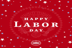 Plakat mit "Happy Labor Day" in fetten weißen Buchstaben auf einem hellroten Hintergrund, umgeben von Sternen verschiedener Größen und Farben.